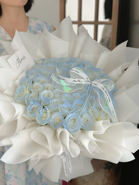 33 Ice blue roses bouquet
